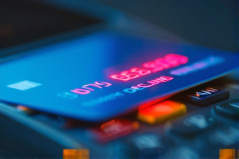 Belarusian bank payment card being declined on a card reader terminal with a red light